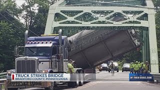 Portion of Route 6 closed near Troy after truck strikes bridge