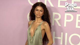 Zendaya shines in plunging fringe gown at Green Carpet Fashion Awards