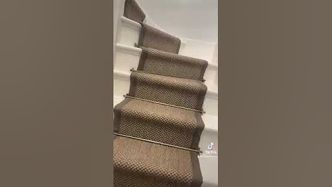 Oriental pewter sisal stair runner on turning steps