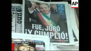 Calderon meets military, calm returns to capital after inauguration