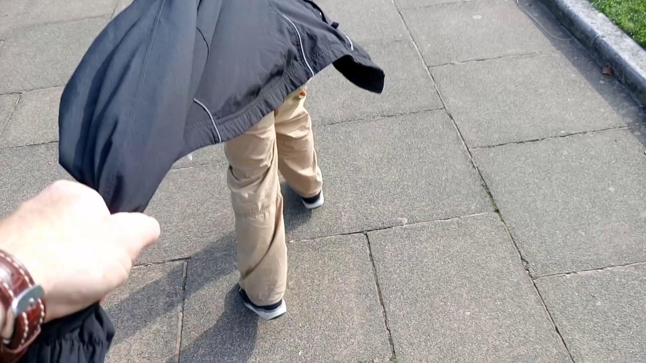 Me pulling my Dad on a penny board, everyone move we are coming through!