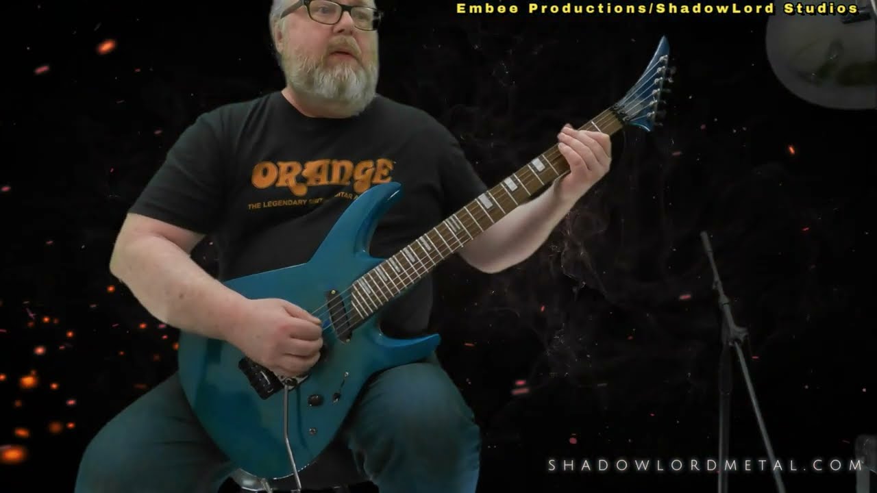Jackson? Washburn? 27 fret guitar demo played through a Peavey Valve King 100. Superstrat for sure.