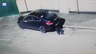 CCTV captures man placing GPS tracker on family's car in Manchester