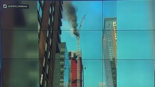Part of construction crane catches fire in Manhattan