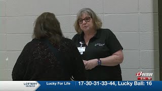 Job seekers visit with potential employers at Topeka Job Fair