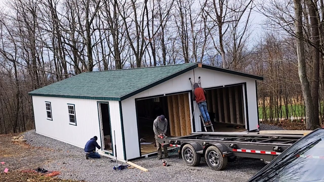 Setting Double Wide Portable Garage Esh's Storage Barns YouTube