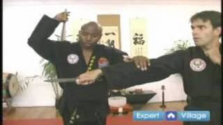 How to Use Hapkido Weapons : How To Use a Fan Defense