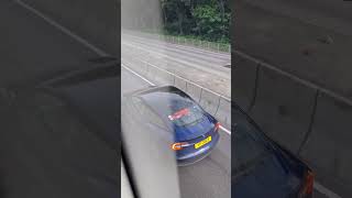 when a blue tesla on the highway