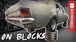 BLOCKED UP! How To Build Wheel Stands | Storage Sedan is Back | BackyardBuilds