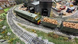 D2 and D3 pass the engine sheds pulling heavy freight.
