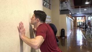 How to Do an Elbows-In Wall Push-Up