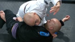 Lapel choke from side control or half