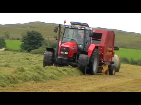 Baling with Massey-Ferguson - Raking with a Deere