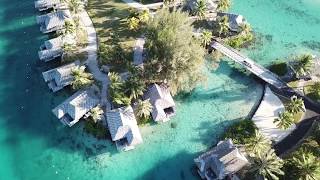 Over the water bungalows on the Island of Moorea in Tahiti - Aerial View