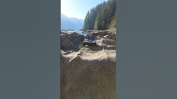 Rc axial Scx10ii Toyota rock jump #scale #rctruck #slowmotion #jump #rock #sendit #insane #crawler