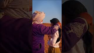 How is a short headscarf traditionally worn by Berbers