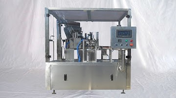 automatic rotary bottles caps feeding capping side labeling machinery 全自動定位圓瓶貼標機