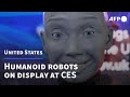 Creepy meets cool in humanoid robots at CES tech show | AFP