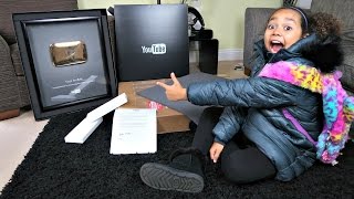 1 MILLION SUBSCRIBERS GOLDEN PLAY BUTTON SURPRISE PRESENT! YouTube Plaque - After School Reaction