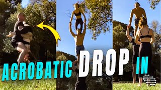 3 Acrobats Perform a Drop in a Park