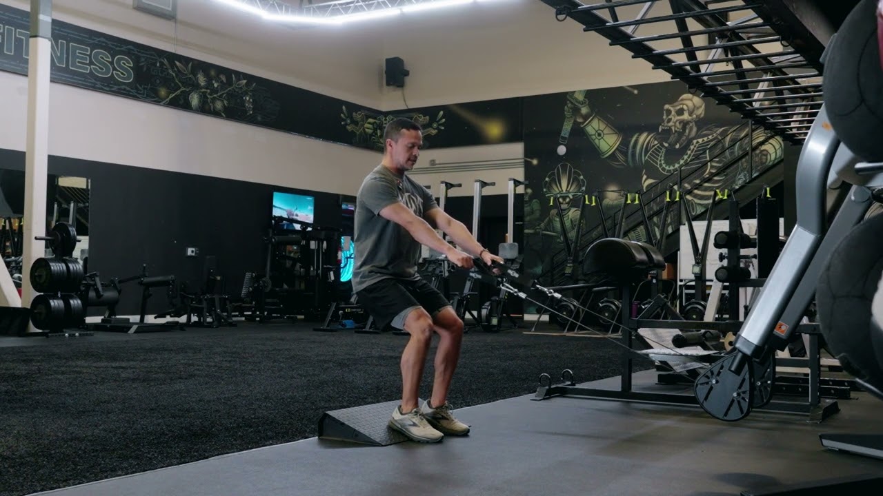 Heel Elevated Squatt with Cables