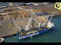 LHM 550 Mobile Harbour Crane. Loading Logs, New Zealand