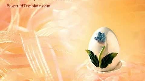 Easter Egg With Blue Flower PowerPoint Template by PoweredTemplate.com