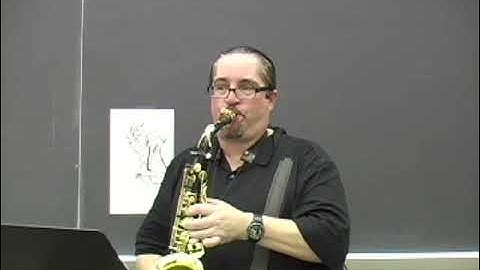 Slurring Down to D or G and Getting an Overtone