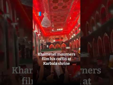 Khamenei mourners film his coffin at Karbala shrine