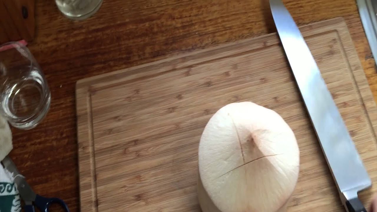 How to open up a coconut for water | Recipe30