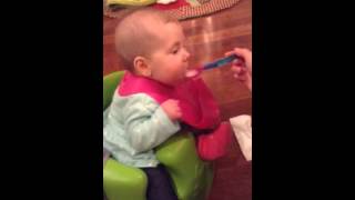 Funny - Baby eating Cereal for First Time