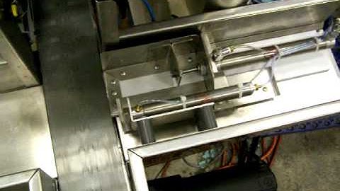 TORR Industries conveyor inspection, and reject station close up