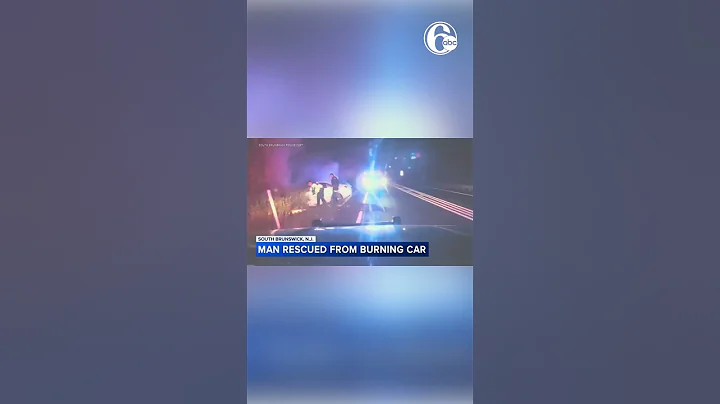 Dramatic video: Police pull driver from car fire in harrowing rescue