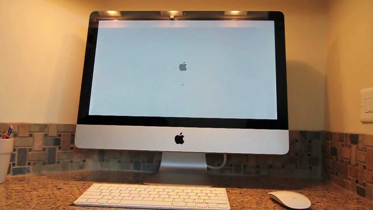 New 2011 Apple iMac Unboxing and Startup: 21.5