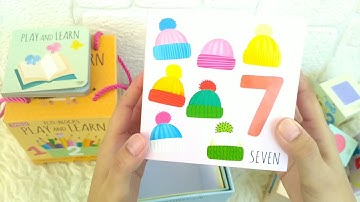 Stacking Blocks Play and Learn includes 10 Stacking Blocks + Board Book