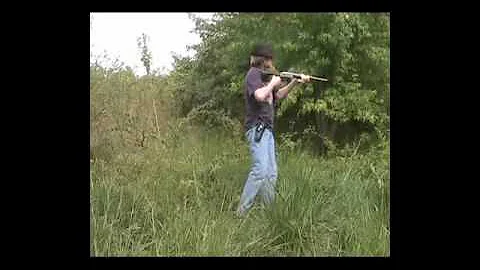 Firing a quick shot from my .410 gauge snake charmer