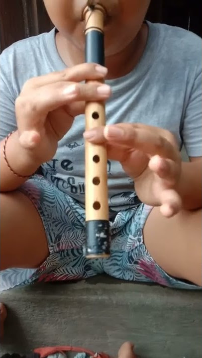 suling ratu anom, komang adi