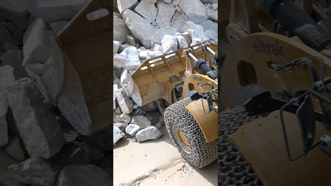 CAT 986K Wheel Loader Collects Stones in its Bucket 