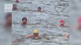 Swimmers Compete In Pragues Icy River