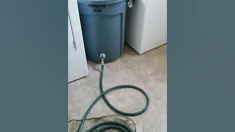How to fix overflow from a washer that drains faster than house plumbing can handle.