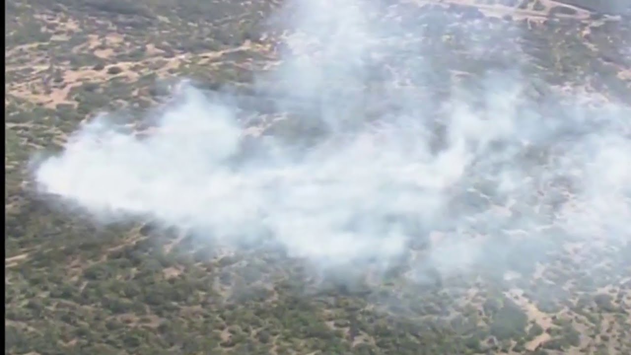 Crews respond to brush fire north of Hondo - YouTube
