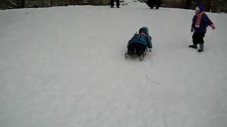 Josiah sledding by himself