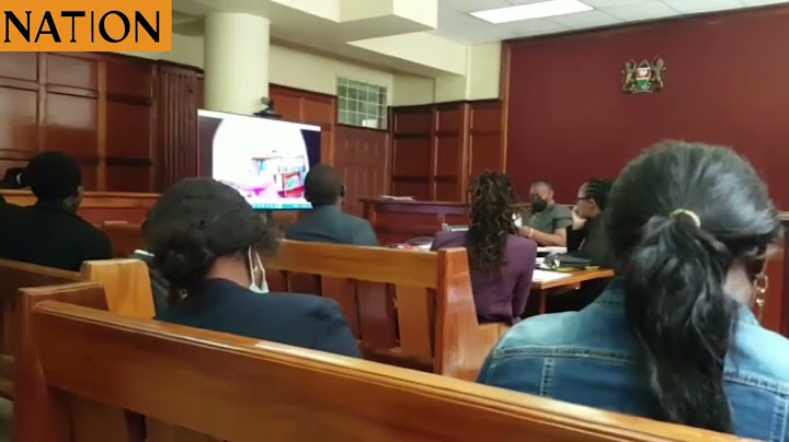 Lawyer Danstan Omari cross-examines journalist Peter Magaka who reported on the sale of babies