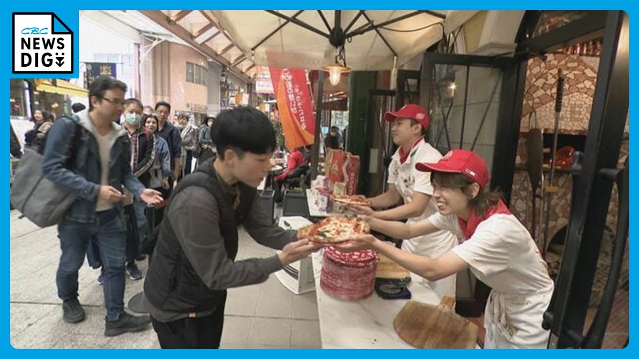 1000 freshly baked pizzas distributed in Osu Shopping Street