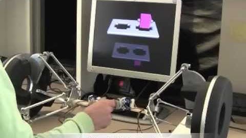 Two finger grasping simulation with cutaneous and kinesthetic force feedback