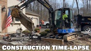 Construction time lapse with￼ John Deere 35G mini excavator Removing sidewalk re-grade topsoil seed