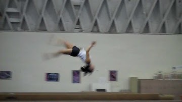 Back handspring, layout step out on beam