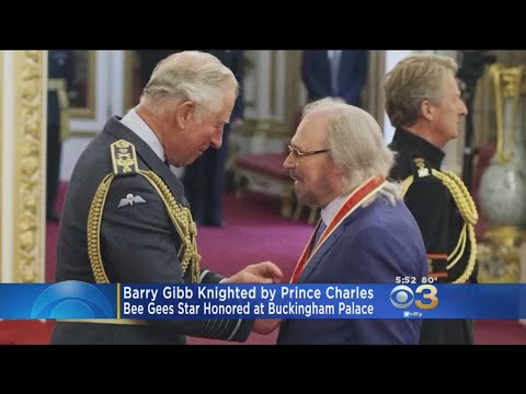 Barry Gibb Knighted By Prince Charles