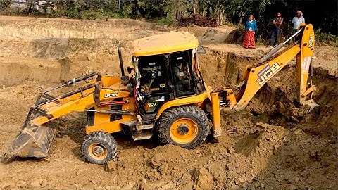 JCB Cutting A Soil - JCB Backhoe Loader Working Village Area - JCB Loading A Soil In Tripper Dump