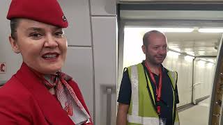 Friendly Turkish Airlines Crew Welcome Passengers Aboard 